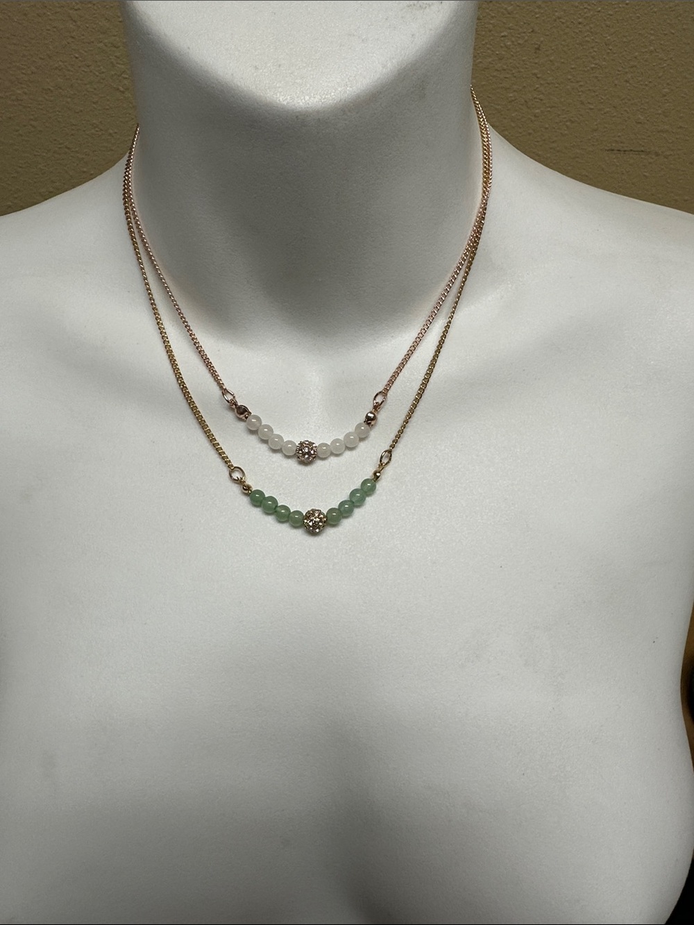 ##122, Set Guess/Marciano Rose Gold Layered Necklace with White and Green Beads